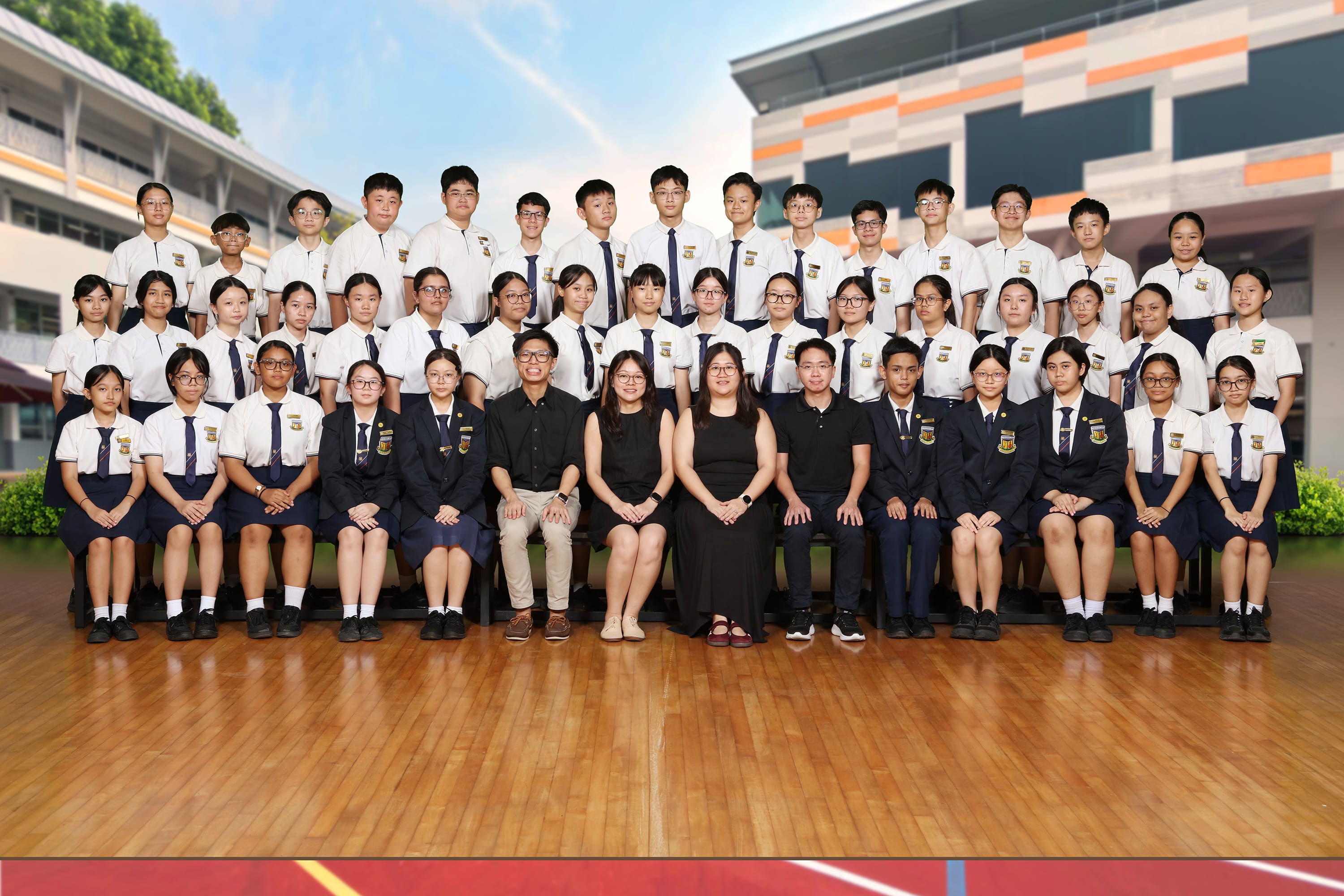 2024 Juying Secondary School Student Council group photo with students in uniform and teachers seated in rows.